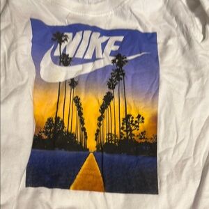 Nike White Graphic Tee with Sunset Design